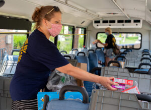 Preston packs bus for school students